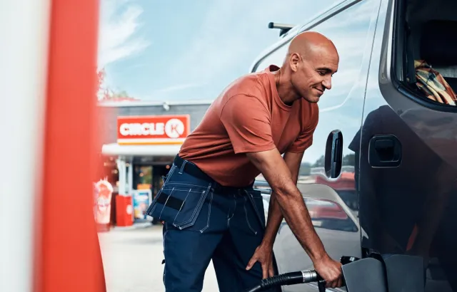 Man fueling his truck